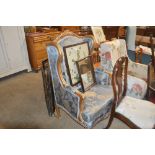 A French style gilt wing back salon armchair with