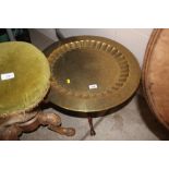 An Eastern brass tray topped table raise don foldi