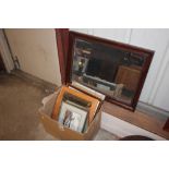 A mahogany framed mirror; and a box of various pic