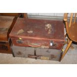Two brown leather suitcases; and a wooden bound tr