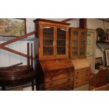 A George III mahogany and boxwood strung bureau bo