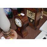 An Edwardian mahogany and inlaid balloon shaped ma