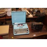 An Imperial portable typewriter; and an Ekco HT un