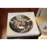 Four Royal Doulton collector's plates