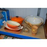 Two large mixing bowls; Le Creuset cooking dishes;