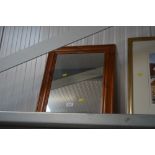 A pine framed wall mirror