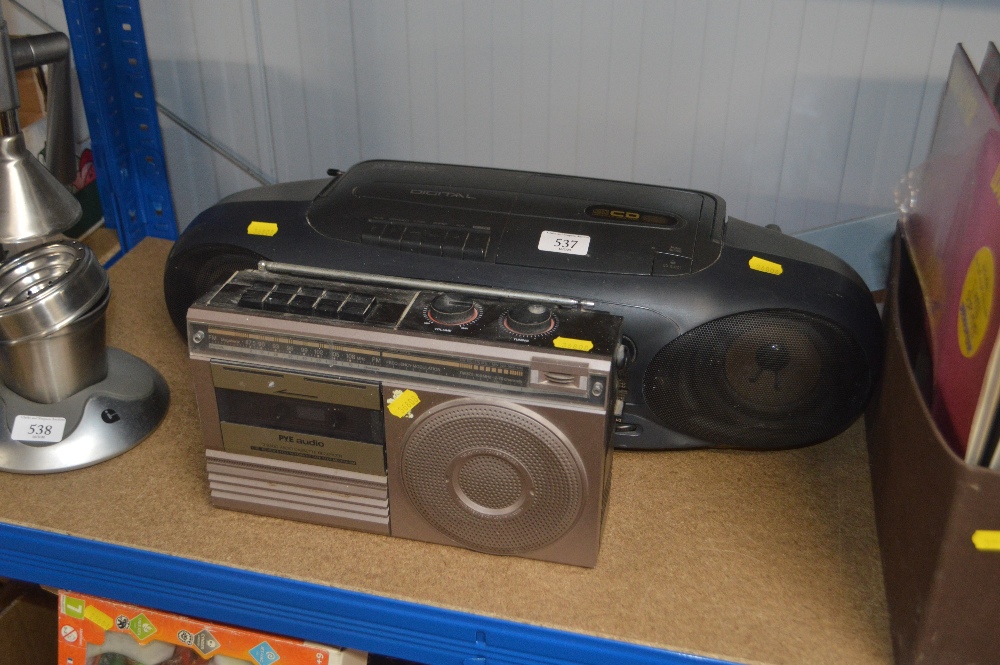 A sharp radio CD player together with a Pye audio