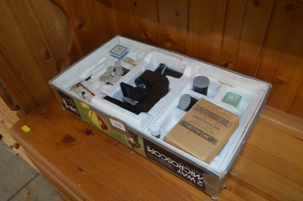 A two way microscope in original box