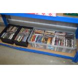 A box of DVDs and two boxes of CDs