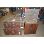 Two metal bound trunks; a hanging cupboard and a s