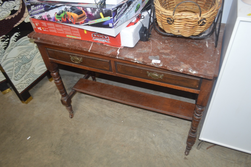 A marble topped wash stand fitted two drawers