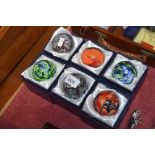 Six boxed paperweights (127)
