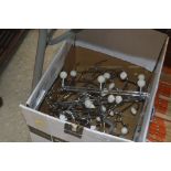 A box of various hooks