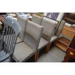 A set of six striped upholstered dining chairs