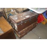 A wooden bound trunk together with a metal bound t