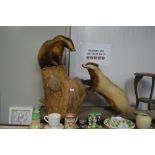 A taxidermy arrangement of Bovarian badgers on a t