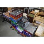 Two multi-drawer metal and plastic chests and cont