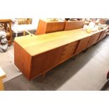 A teak G-plan style sideboard, the interior shelve