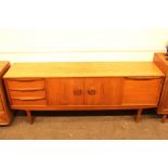 A teak G plan design sideboard, fitted three drawe