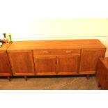 A British teak G plan design sideboard, fitted cen