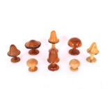 Eight various treen toadstools