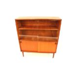 A teak G-plan style bookcase the upper shelves enc