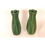 A pair of Dartmouth green pottery vases