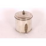 An Arts & Crafts hand planished silver plated bisc