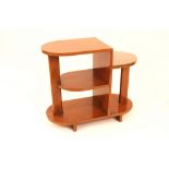 An Art Deco walnut three tier occasional table