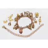 A 9ct gold charm bracelet set with various 9ct gol