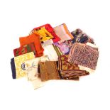 A collection of various vintage silk scarves