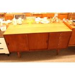 A British teak G-plan design sideboard, the interi