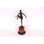 An Art Deco design bronze figure of a semi-naked d