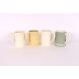 Keith Murray for Wedgwood, four mugs in green buff