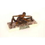 An Art Deco cold painted bronzed figure, of a danc