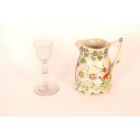 An Antique English drinking glass, with vine etche