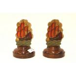 A pair of 1920's/30's book-ends, painted with gall