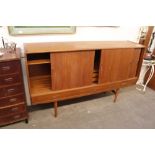 A Danish teak side cabinet, the interior shelves a