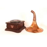 A gramophone with copper horn