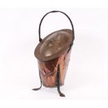 An Art Nouveau design copper coal scuttle, having