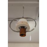 A Bakelite and chrome pendant light fitting, with