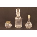 Three 19th Century faceted glass cruet bottles in