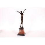 An Art Deco style bronze figure of a dancing girl,