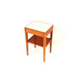 A near pair of teak and Formica ex War Department two tier bedside tables