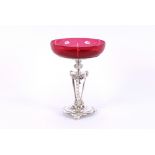 An electroplated and cranberry glass table centrep