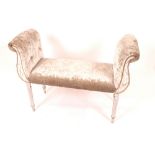 A duet stool with silver crushed velvet upholstery