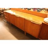 A teak G-plan design long sideboard fitted drop fl