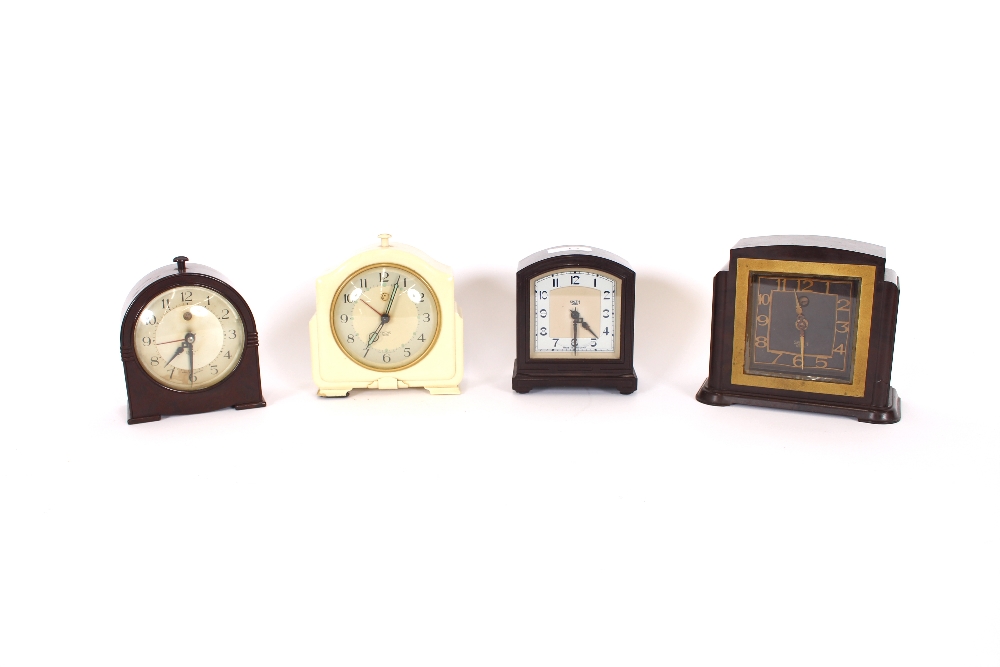 Four Art Deco design Bakelite cased mantel clocks