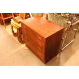 A teak four drawer chest of small proportions, 70c