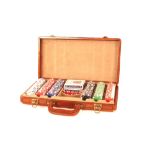 A tan leather cased poker set and contents